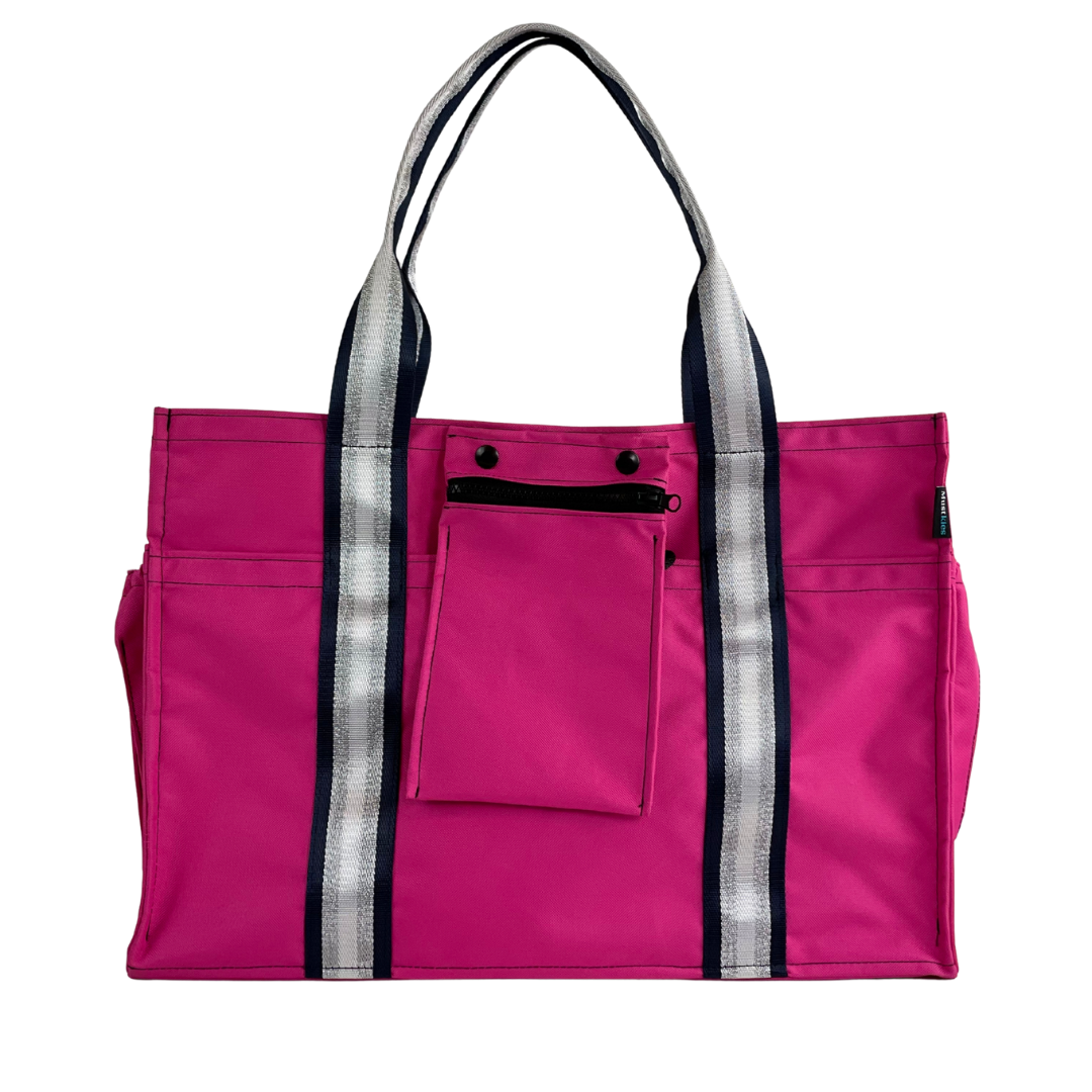 Close-up of Mustkies Sydney Tote crafted in a  pink fabric with a silver stripe as a shoulder strap