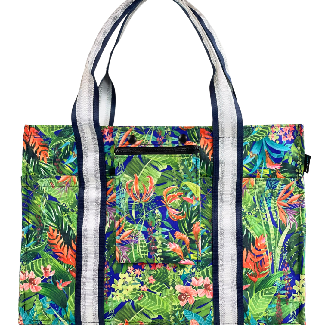 Mustkies Sydney tote crafted in a Jungle print with Navy silver strap and an orange lining.