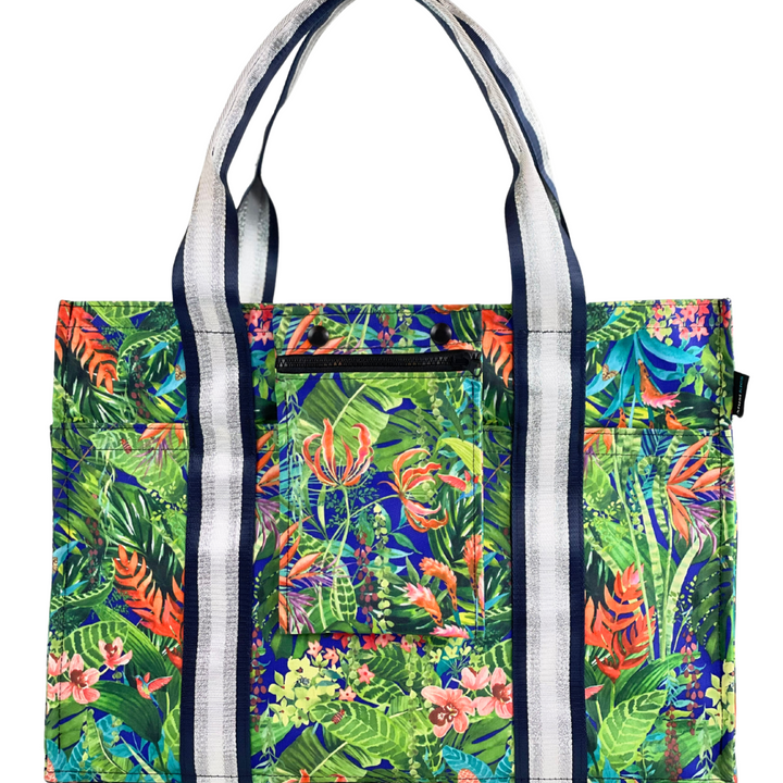 Mustkies Sydney tote crafted in a Jungle print with Navy silver strap and an orange lining.