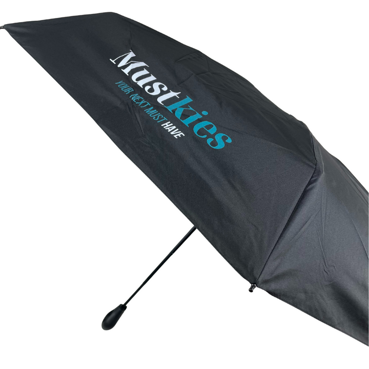 Black umbrella with 'Mustkies' branding on a white background