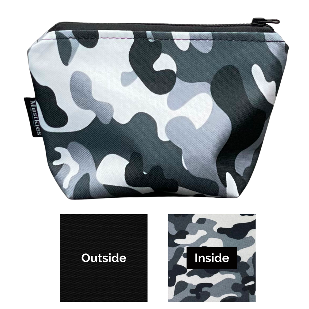 Muskties AMI Black with Gray Camouflage lining Make-up bag swatch sample. Handcrafted in waterproof canvas and finished with a black zipper to secure your make-up/cosmetics. Available in 6 color options and two sizes. Gray Camouflage with Charcoal Lining, Green Camouflage with Army Green Lining, Blush with Gray Camouflage Lining and Black with Gray Camouflage Lining, Teal and Yellow with Charchoal Lining. 7"Lx3"Wx10"H & 5Lx3Wx5.5H