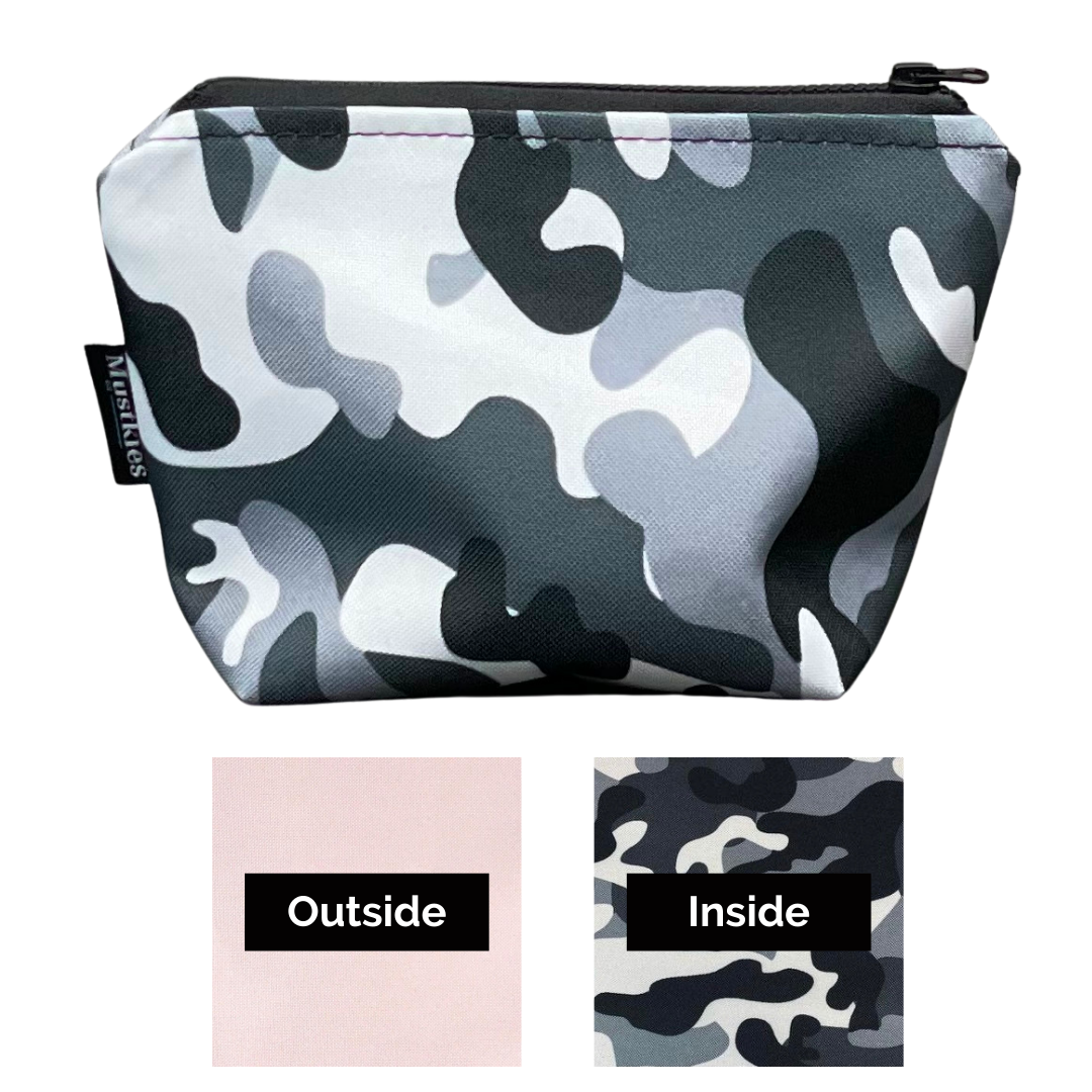 Muskties AMI Blush with Gray Camouflage lining Make-up bag swatch sample. Handcrafted in waterproof canvas and finished with a black zipper to secure your make-up/cosmetics. Available in 6 color options and two sizes. Gray Camouflage with Charcoal Lining, Green Camouflage with Army Green Lining, Blush with Gray Camouflage Lining and Black with Gray Camouflage Lining, Teal and Yellow with Charchoal Lining. 7"Lx3"Wx10"H & 5Lx3Wx5.5H