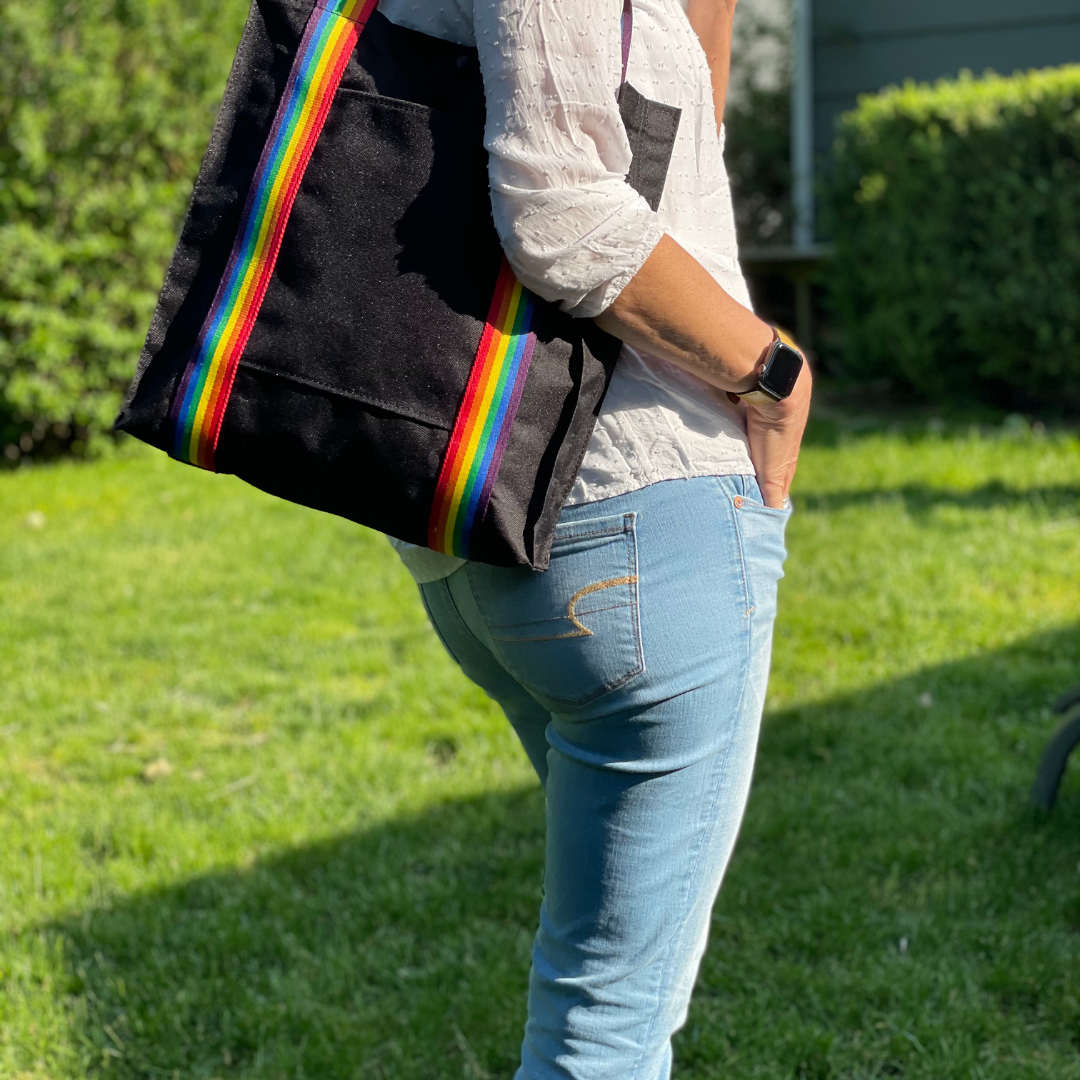 Mustkies PRIDE Black|Rainbow Pride Tote Bag Color Swatch. Ultimate waterproof Canvas Tote Bag that can go almost anywhere. Ultimate waterproof Canvas Tote Bag that can go almost anywhere. Measures 13.5"Lx3"Wx14.5"T. Supporting the LGBT community.