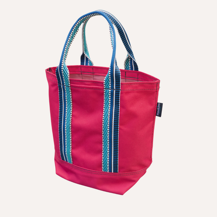Mustkies LENA Handmade shopper tote for both adults and kids. Crafted in a burgundy waterproof canvas with a blue strap.. Great for looking stylish and going shopping with mommy/daddy and friends! Lots of room for your accessories and more. Three inside pockets and 1 mask/key holder. Holds against all types of wear and tear and perfect for all types of indoor and outdoor use. The Tote bag is 7.5"L x 5.5 W x 10" Tall. 5" drop. White Plains NY Small Women Owned Business. Westchester County